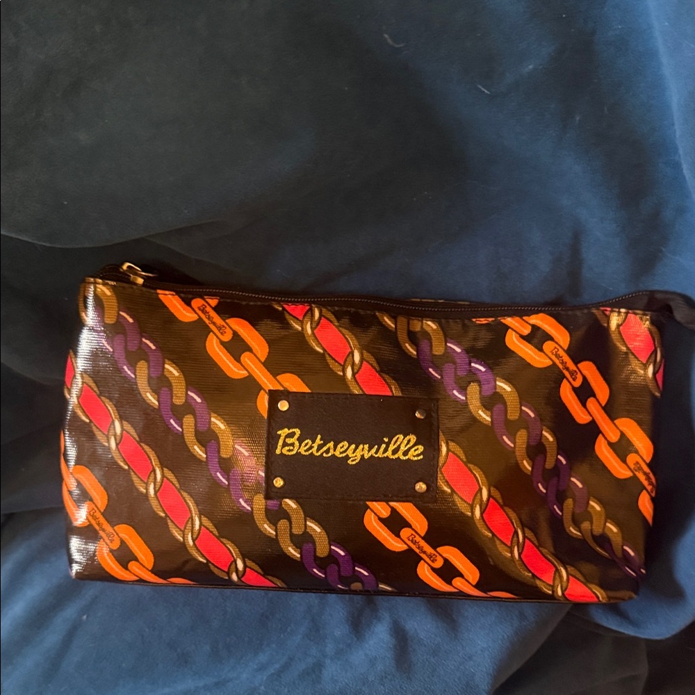 Betsey Johnson Chain Print cometics Bag - Black and Orange